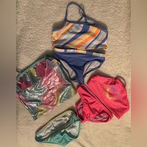 3 almost new swimsuit. XS 4/5. Absolutely NO PILLING rips stains or pulls.